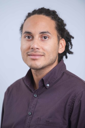 Headshot of Adam Elliott-Cooper