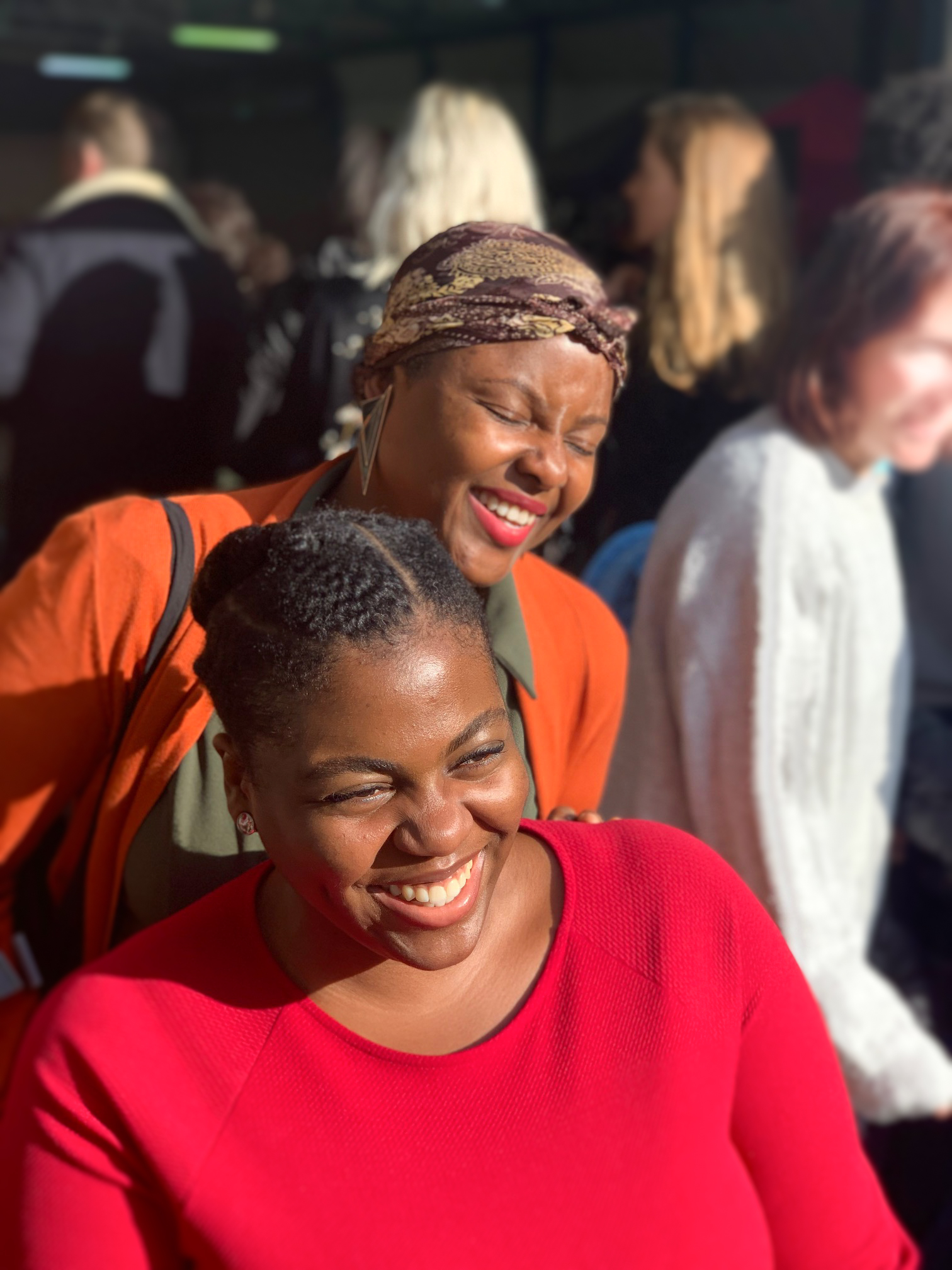 Picture of Kym and Jumoke outside smiling and laughing
